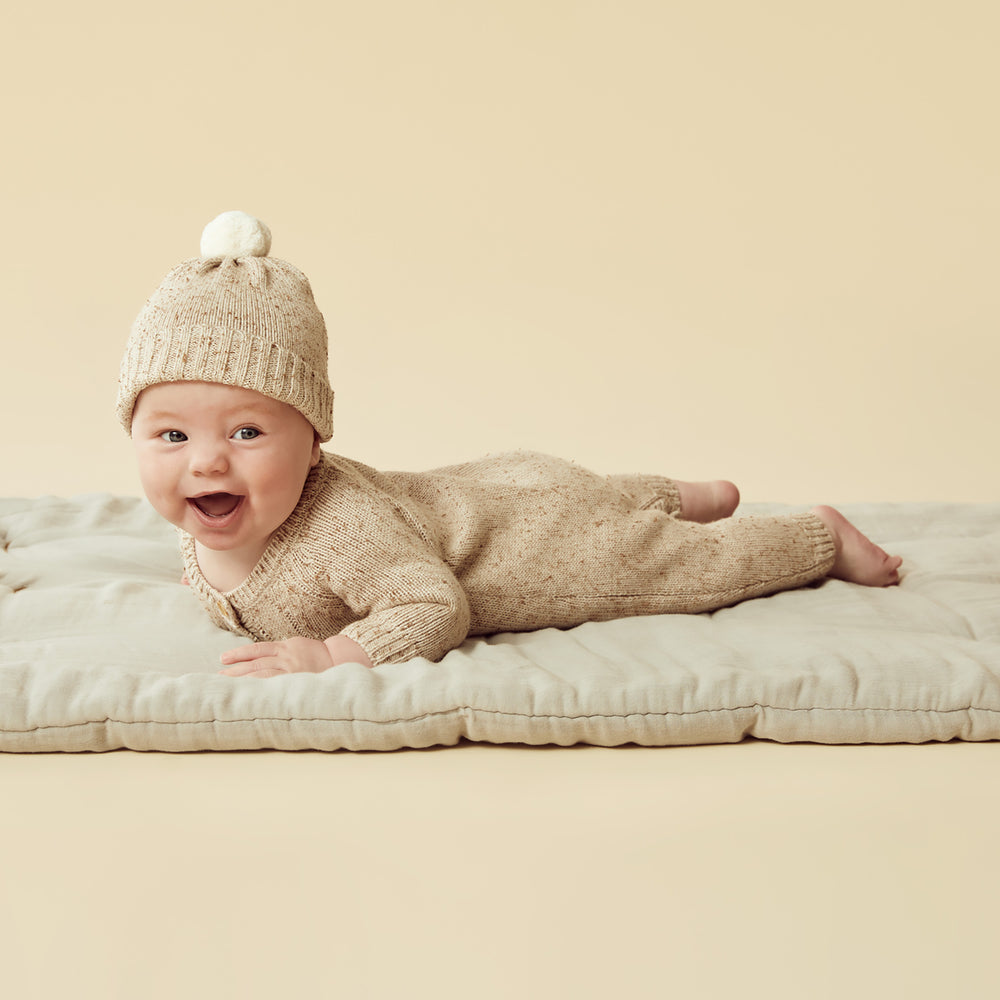 
                      
                        Almond Fleck Knitted Cable Growsuit
                      
                    