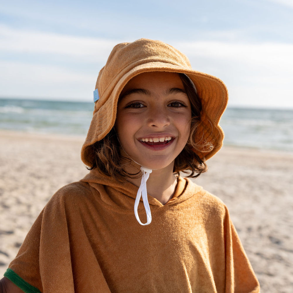 
                      
                        Terry Towelling Bucket Hat | Caramel
                      
                    