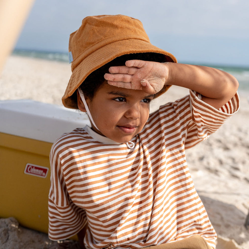 
                      
                        Terry Towelling Bucket Hat | Caramel
                      
                    