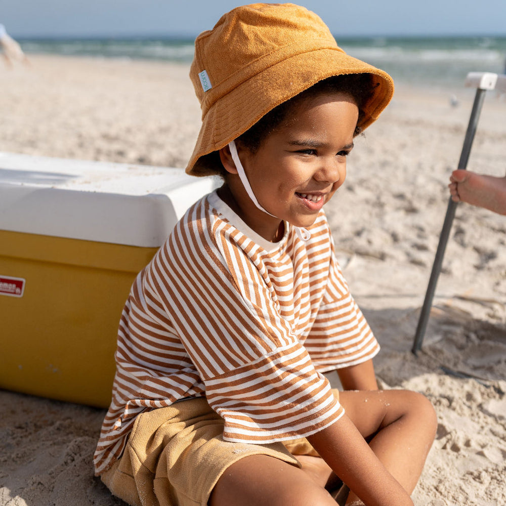 
                      
                        Terry Towelling Bucket Hat | Caramel
                      
                    