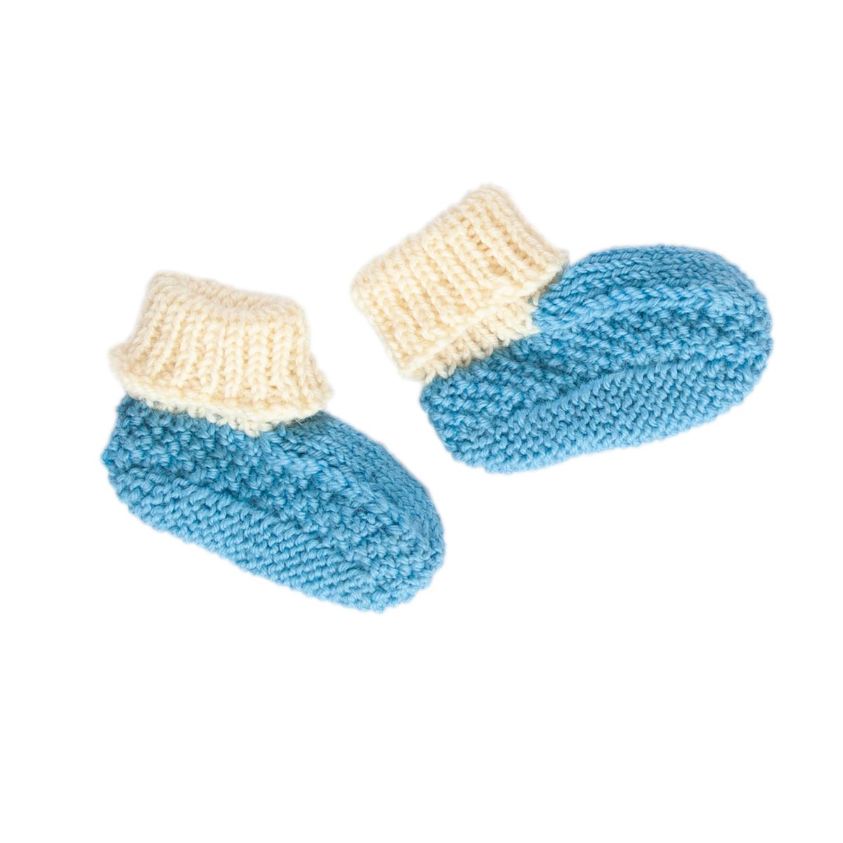 Pair of blue knitted baby booties with beige tops on a white background