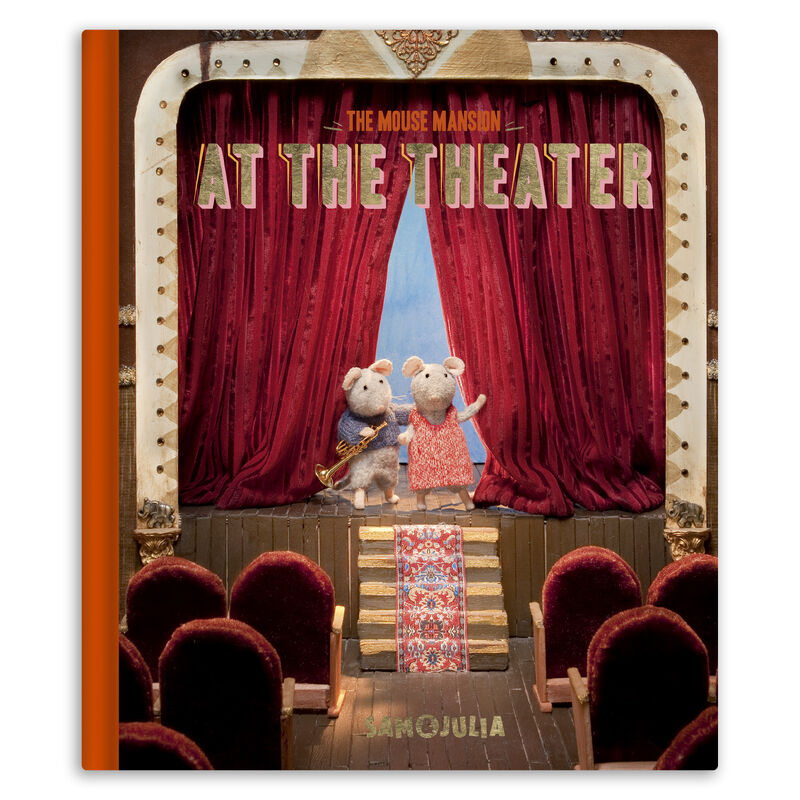 Book cover of 'At the Theater' from 'The Mouse Mansion' with two animated characters on a stage.